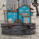 Rustykalny wieszak z tukusowymi domkami No 1