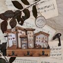 Rustykalny wieszak z domkami no 1