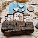 Rustykalny wieszak z domkami no 1