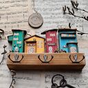 Wieszak z kolorowymi domkami no 1