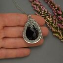 Wisiorek czarny onyks - wire wrapping ze stali chirurgicznej (unikat)