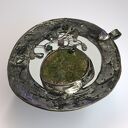 Okrągły wisior z unkaitem