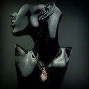 Wisiorek z różowym kwarcem w technice wire wrapping