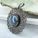 Srebrny wisiorek z błękitnym płomieniem a1101