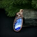 Wisiorek z niebieskim agatem w technice wire wrapping