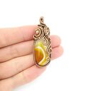 Wisiorek z żółtym agatem wire wrapping - ciepła energia w Twoim stylu