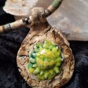 Ceramiczny naszyjnik - amulet Słońce na ozdobnym sznurku