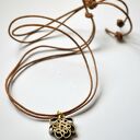 Wisiorek handmade Kwiat z oksydowanego mosiądzu (wire wrapping)