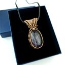 Wisior z ametystem - miedziany wire wrapping z hematytem