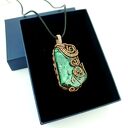 Dwustronny wisior z malachitem