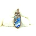 Wisiorek z niebieskim agatem w technice wire wrapping
