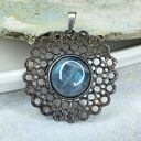 Srebrny wisiorek z błękitnym płomieniem a1101