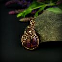 Wisiorek z fioletowym agatem w technice wire wrapping