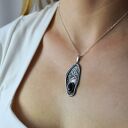 Srebrna zawieszka z górami i onyksem