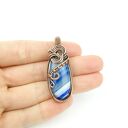 Wisiorek z niebieskim agatem w technice wire wrapping