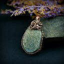 Wisiorek z kwarcem tytanowym - miedziany wire wrapping z hematytami