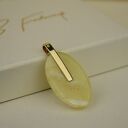 Złoty wisiorek - krzyż osadzony w mlecznym bursztynie ZŁOTO 585