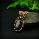 Wisior z ametystem - miedziany wire wrapping z hematytem