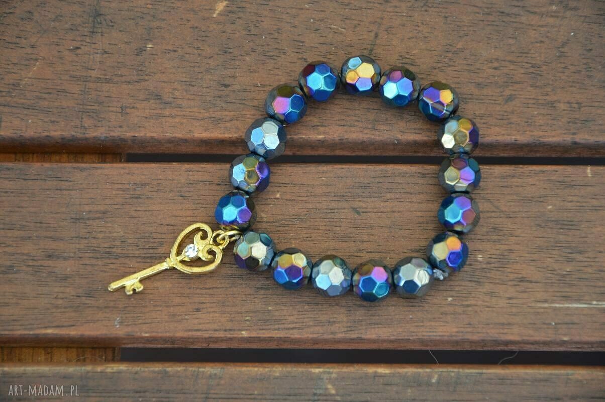 Bracelet by SIS: złoty klucz w otoczeniu czarnych szklanych korali AB