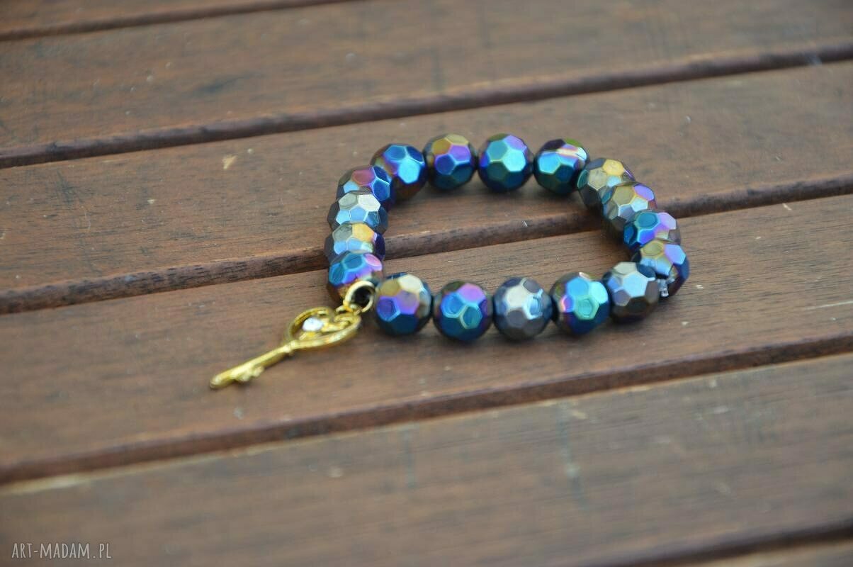 Bracelet by SIS: złoty klucz w otoczeniu czarnych szklanych korali AB