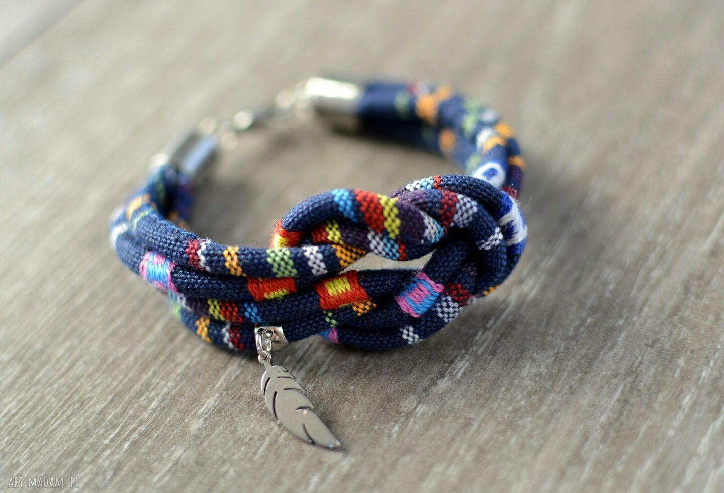Etniczna bransoletka boho z piórkiem - Gipsy Knot