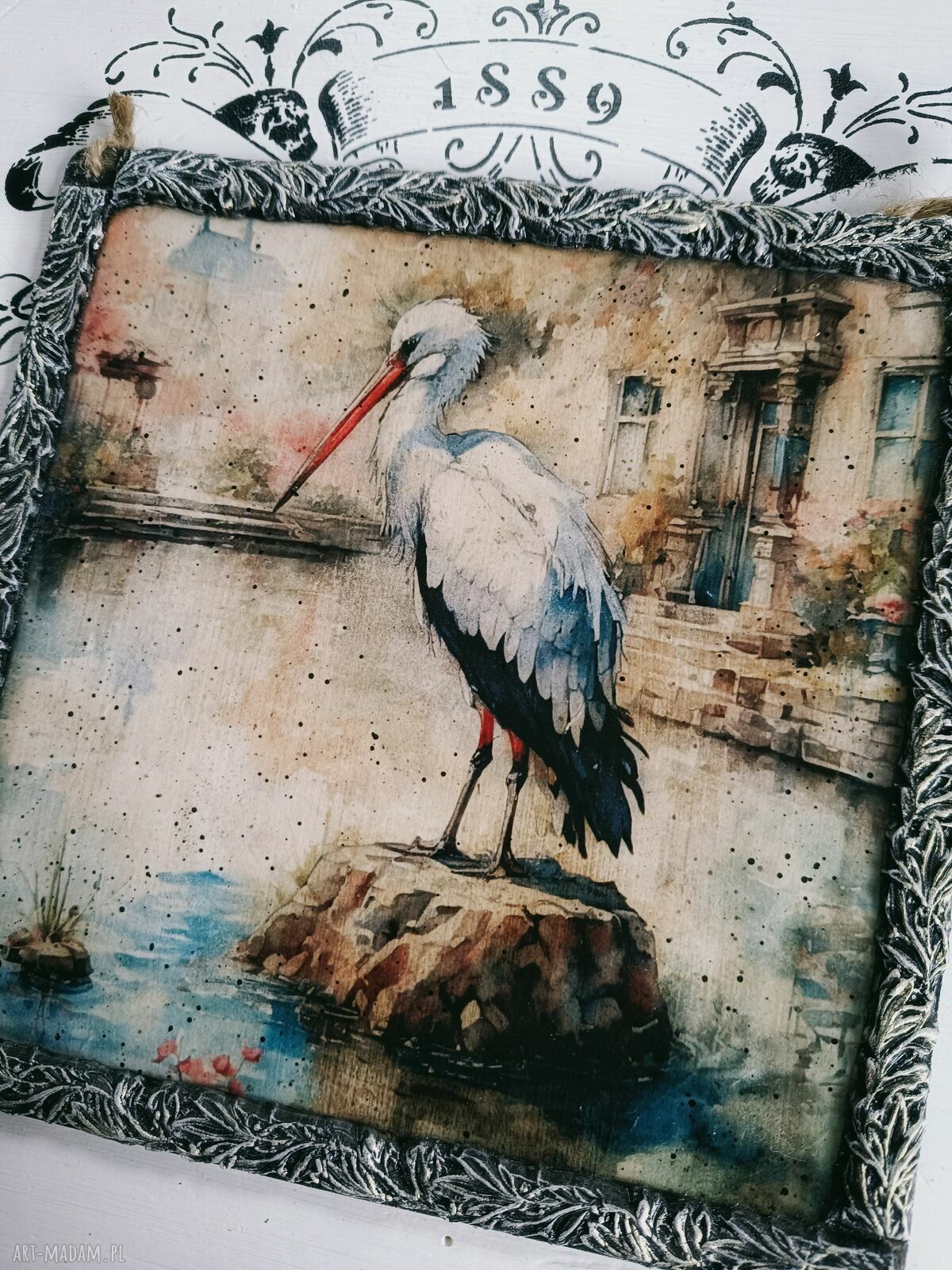 Dekoracyjny obrazek z bocianem w stylu vintage