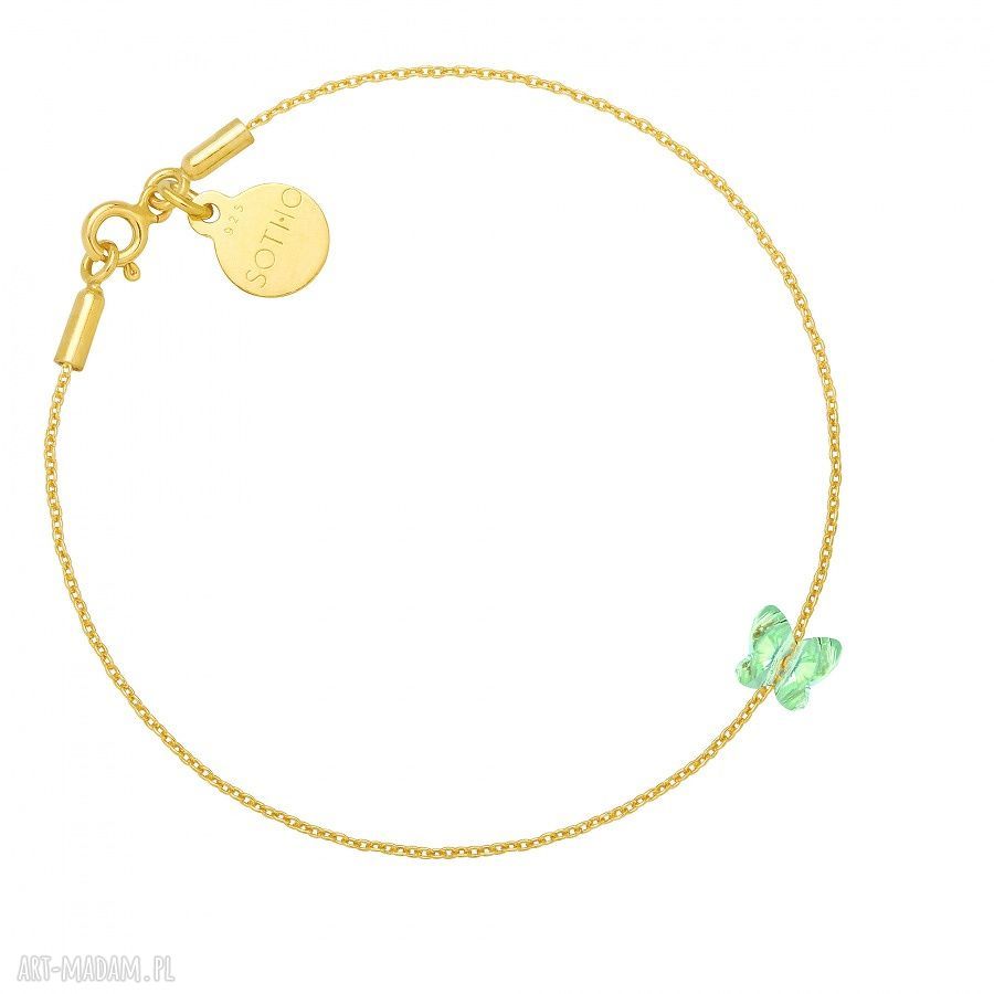 Złota bransoletka zdobiona jasnozielonym motylkiem swarovski®