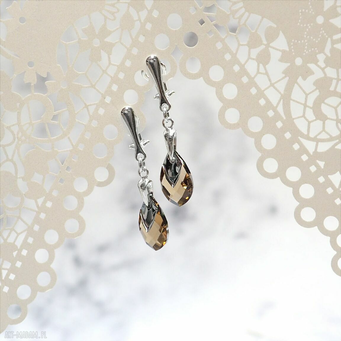 Ekskluzywne srebrne klipsy z kryształami Swarovski Swarovski topaz