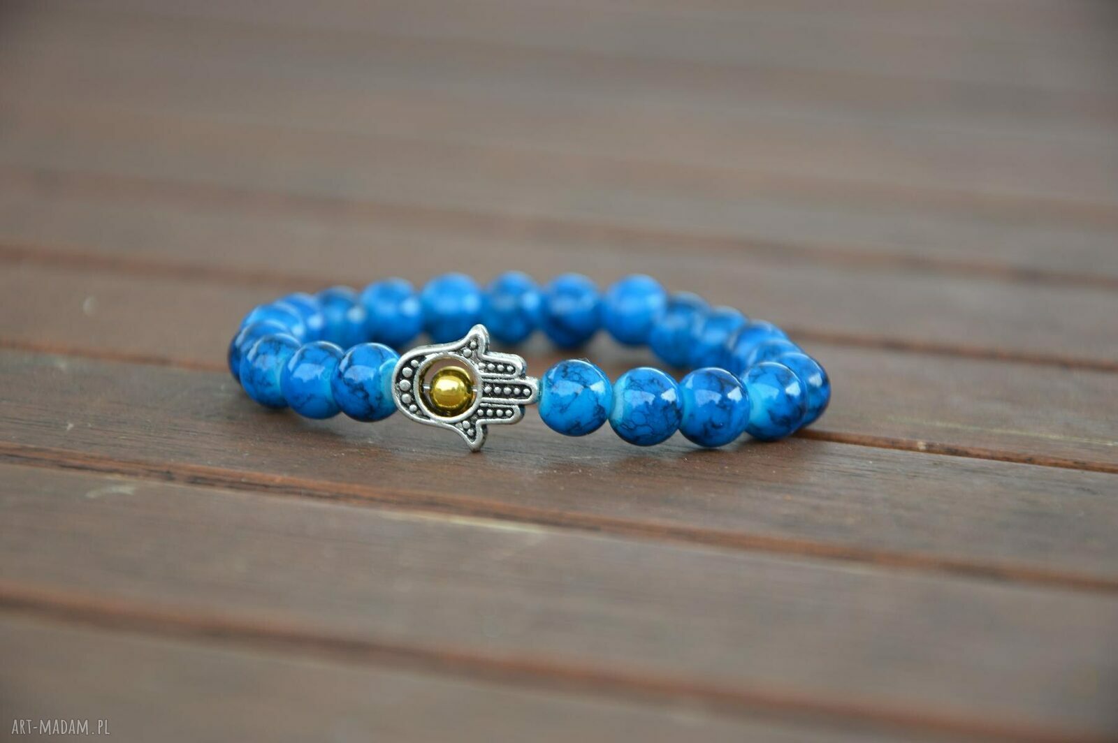 Hamsa w mozaikowych koralach