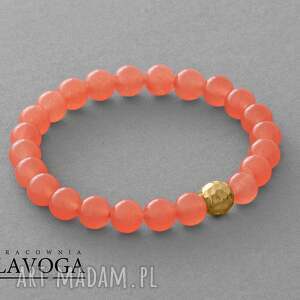 jade with golden bead in peach