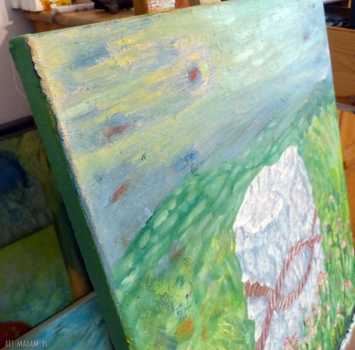 Kamień i sznur - obraz olejny 50x55 cm: zielony pejzaż z symbolicznym białym kamieniem