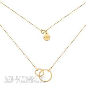 złoty naszyjnik z dwoma kołami