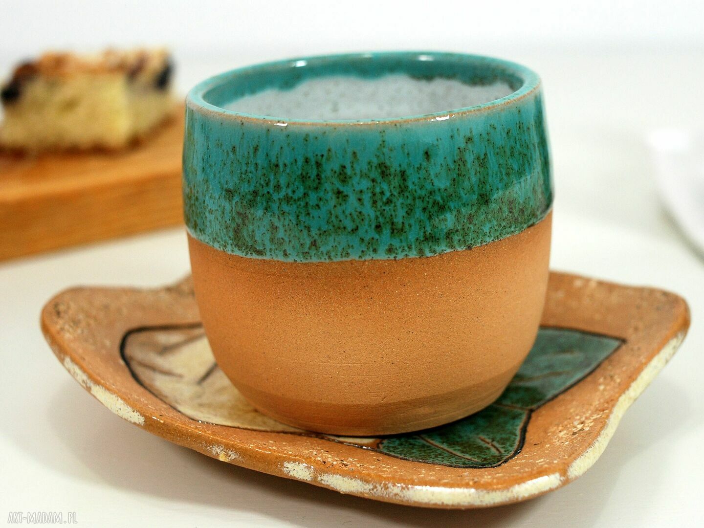 Ceramiczny komplet czarka i talerzyk liść z kotem
