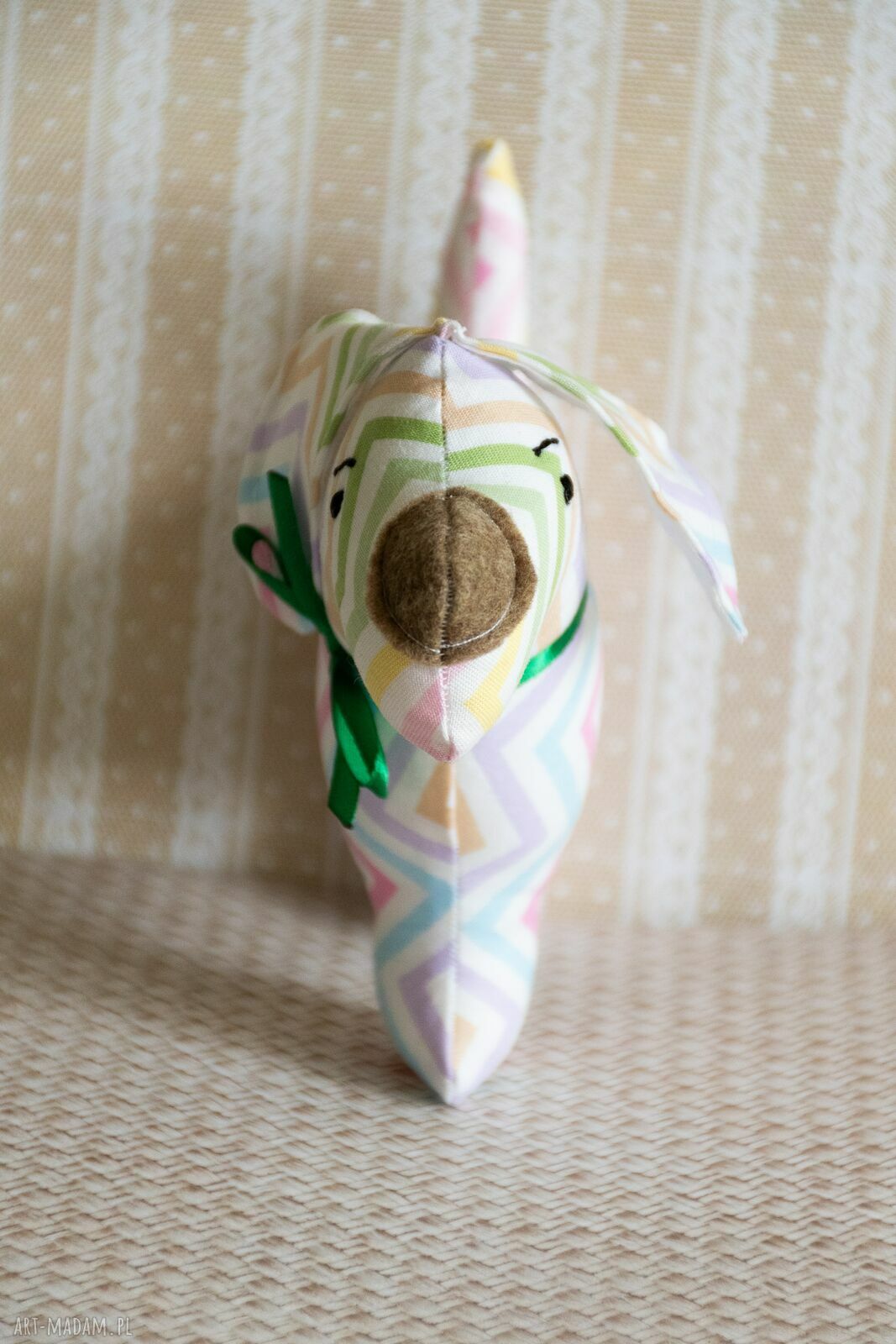Mini piesek Mela - miękka maskotka handmade dla maluszka