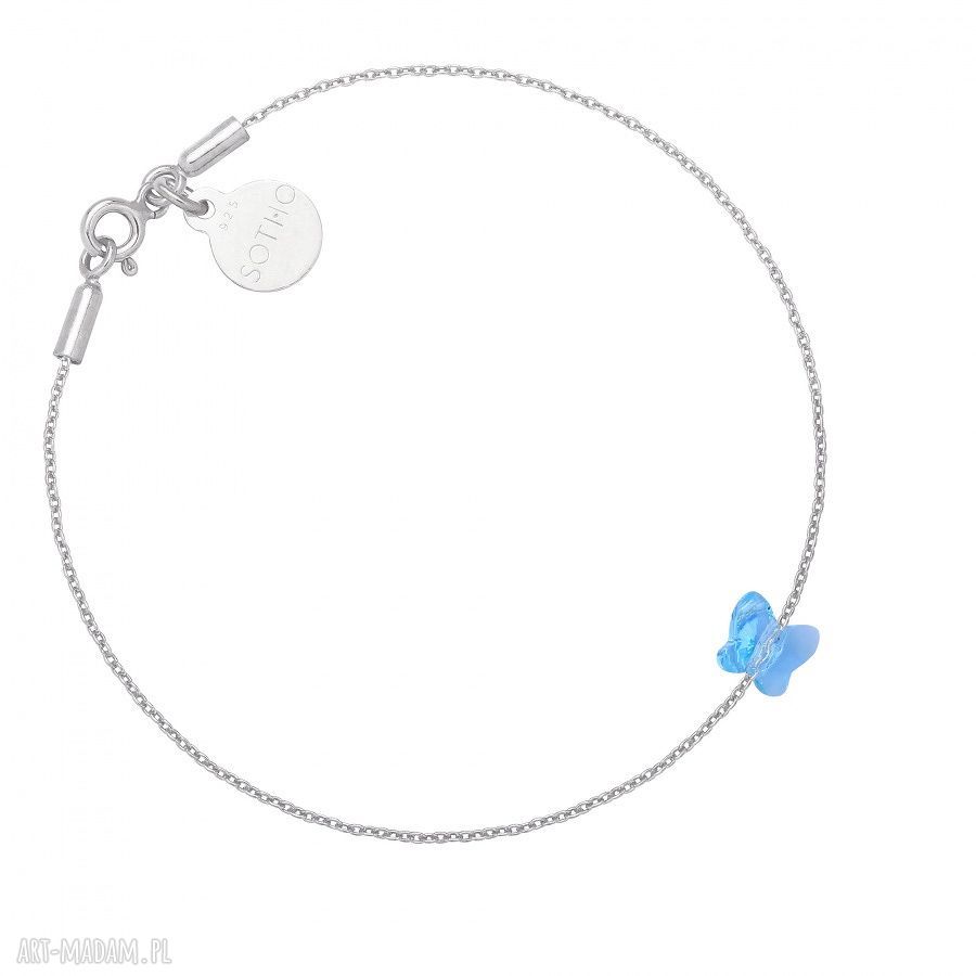 Srebrna bransoletka zdobiona niebieskim motylkiem swarovski®