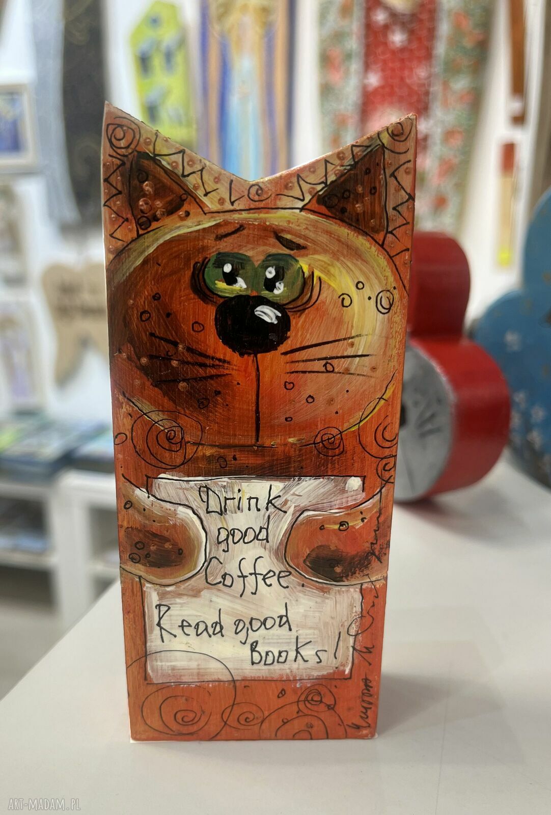 Motywacyjny kotek „Drink good Coffee. Read good Books”