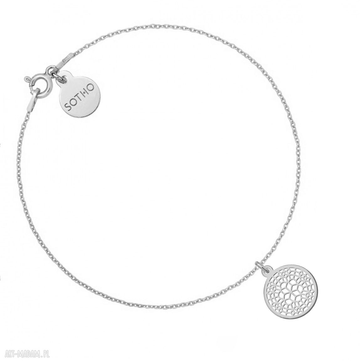 Srebrna bransoletka ażurową rozetką zawieszka
