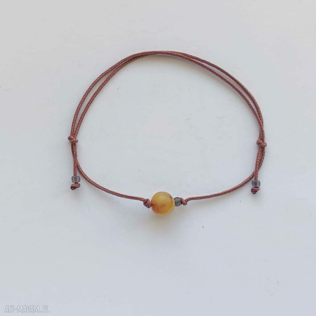 Okrągła bransoletka z bursztynem na sznurku - handmade Katarzyna Kaminska