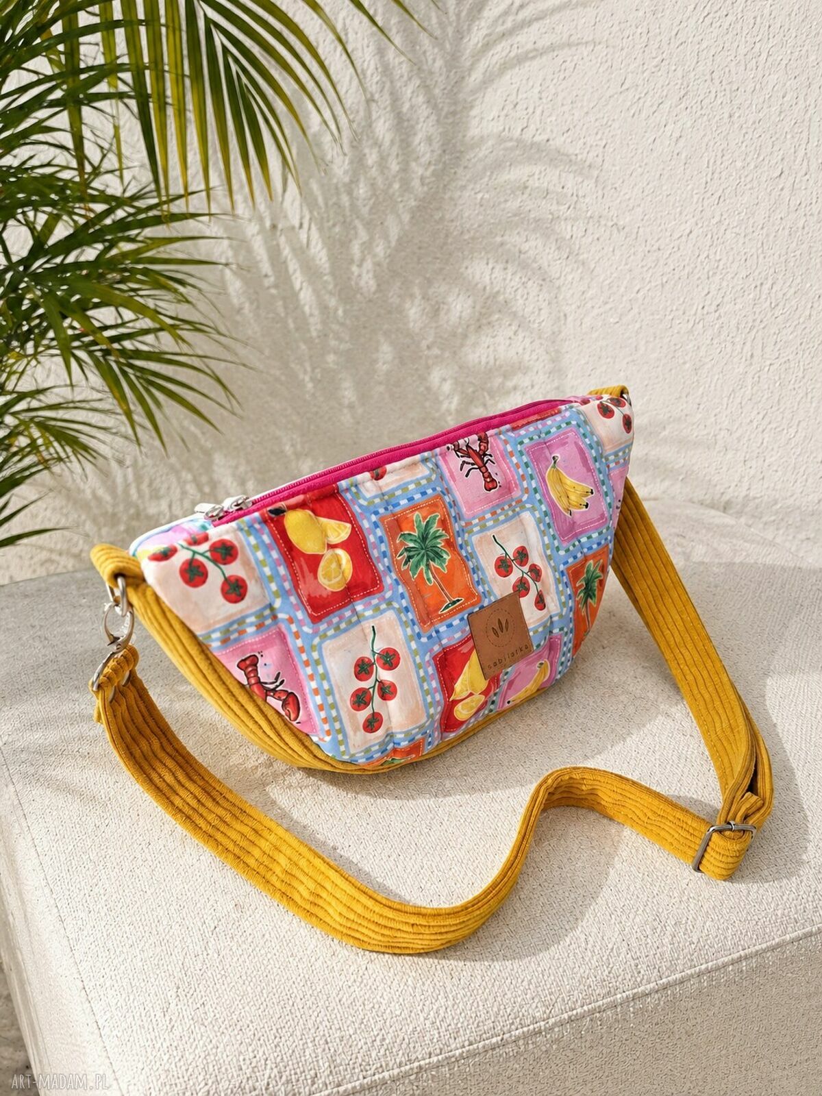 Pikowana torebka nerka crossbody Amalfi na skos
