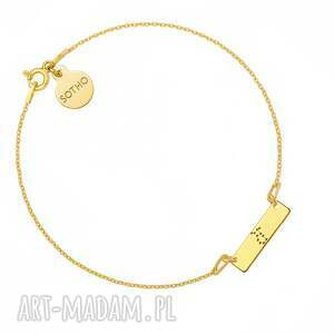 złota bransoletka z konstelacją bliźniąt