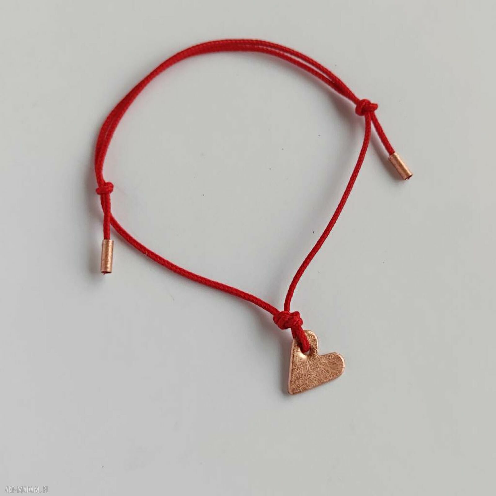 Serduszko z miedzi na ozdobnym sznurku - bransoletka handmade