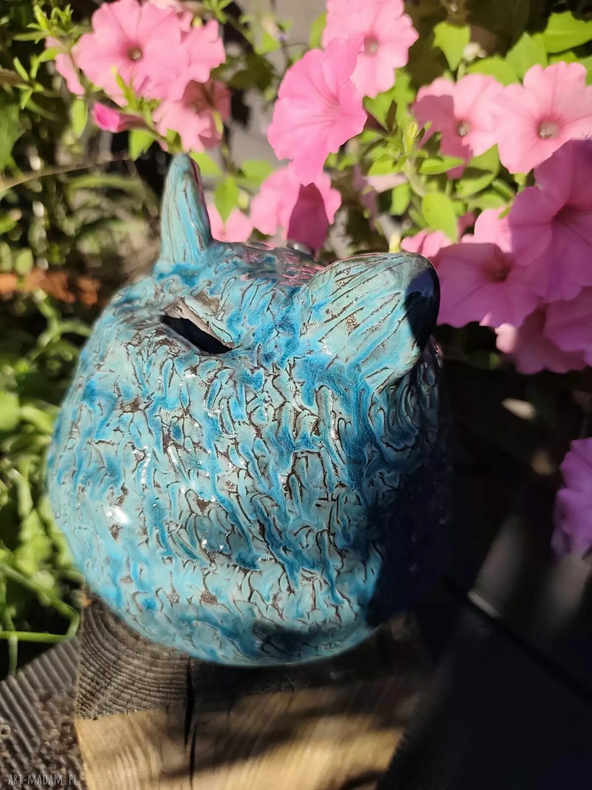 Ceramiczna skarbonka w kształcie grubego kotka