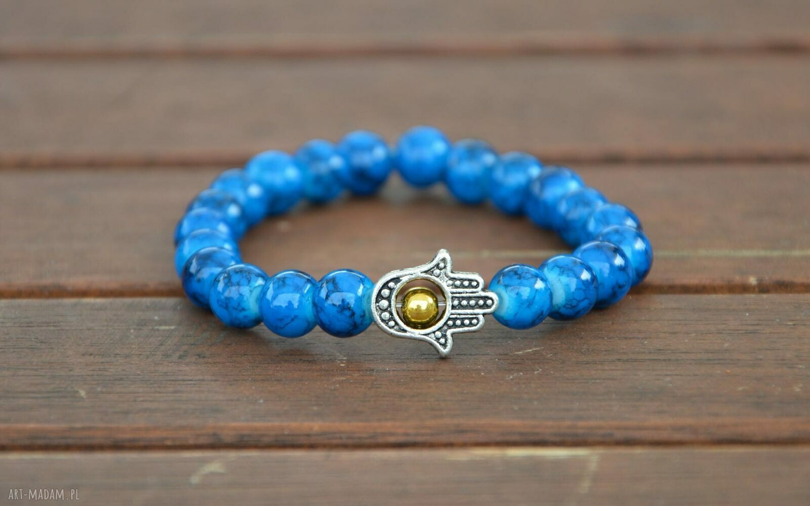 Hamsa w mozaikowych koralach