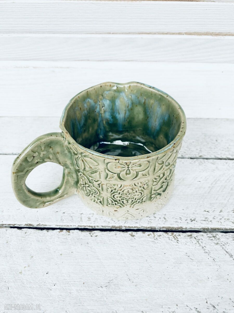 Zielony kubek ceramiczny z motywem portugalskim