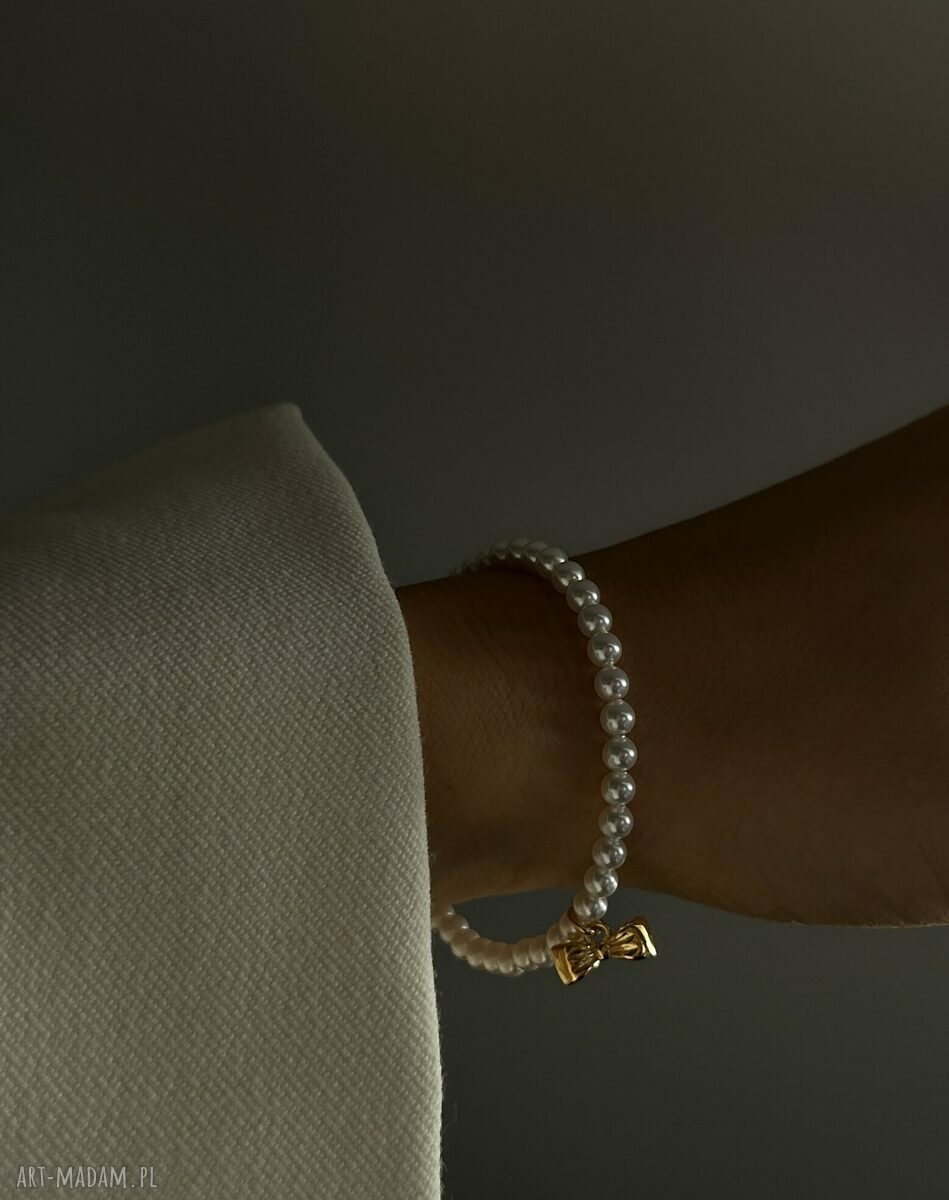 Złota dziecięca bransoletka z białych pereł SWAROVSKI® CRYSTAL z kokardką - 15 cm