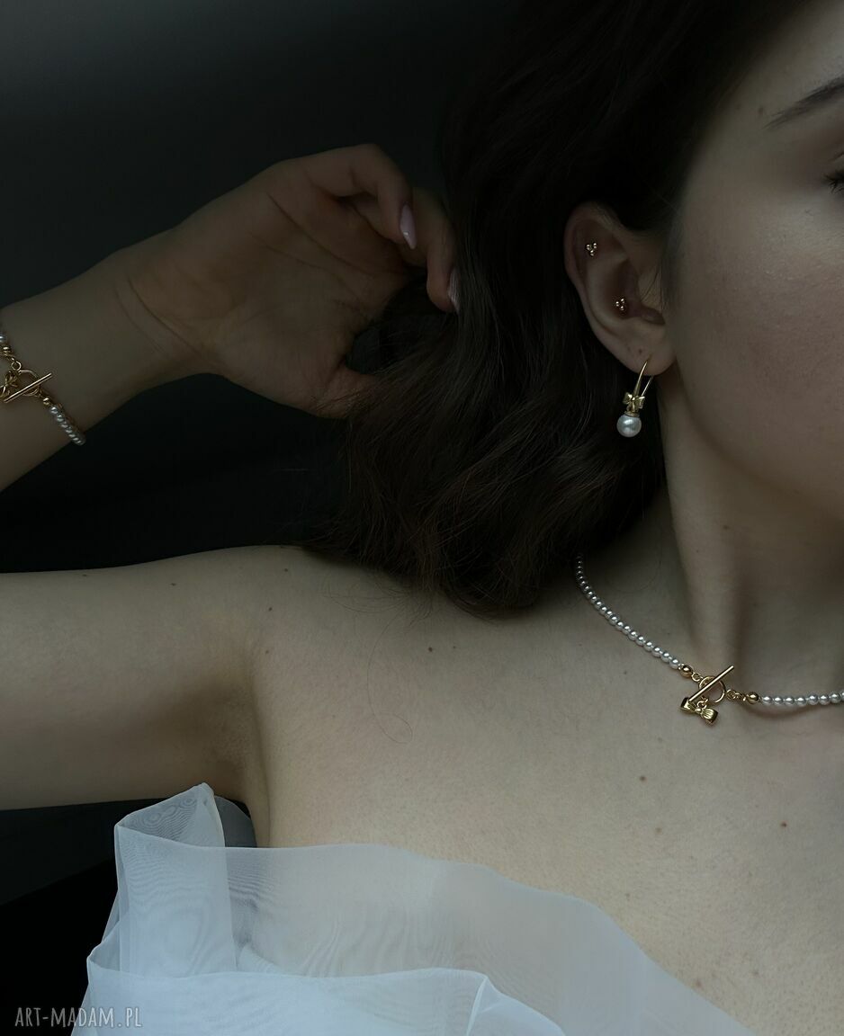 Złote kolczyki z kokardkami i perłami SWAROVSKI® CRYSTAL