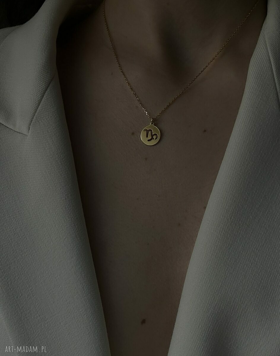 Złoty naszyjnik z zawieszką Koziorożec biżuteria z znakiem zodiaku